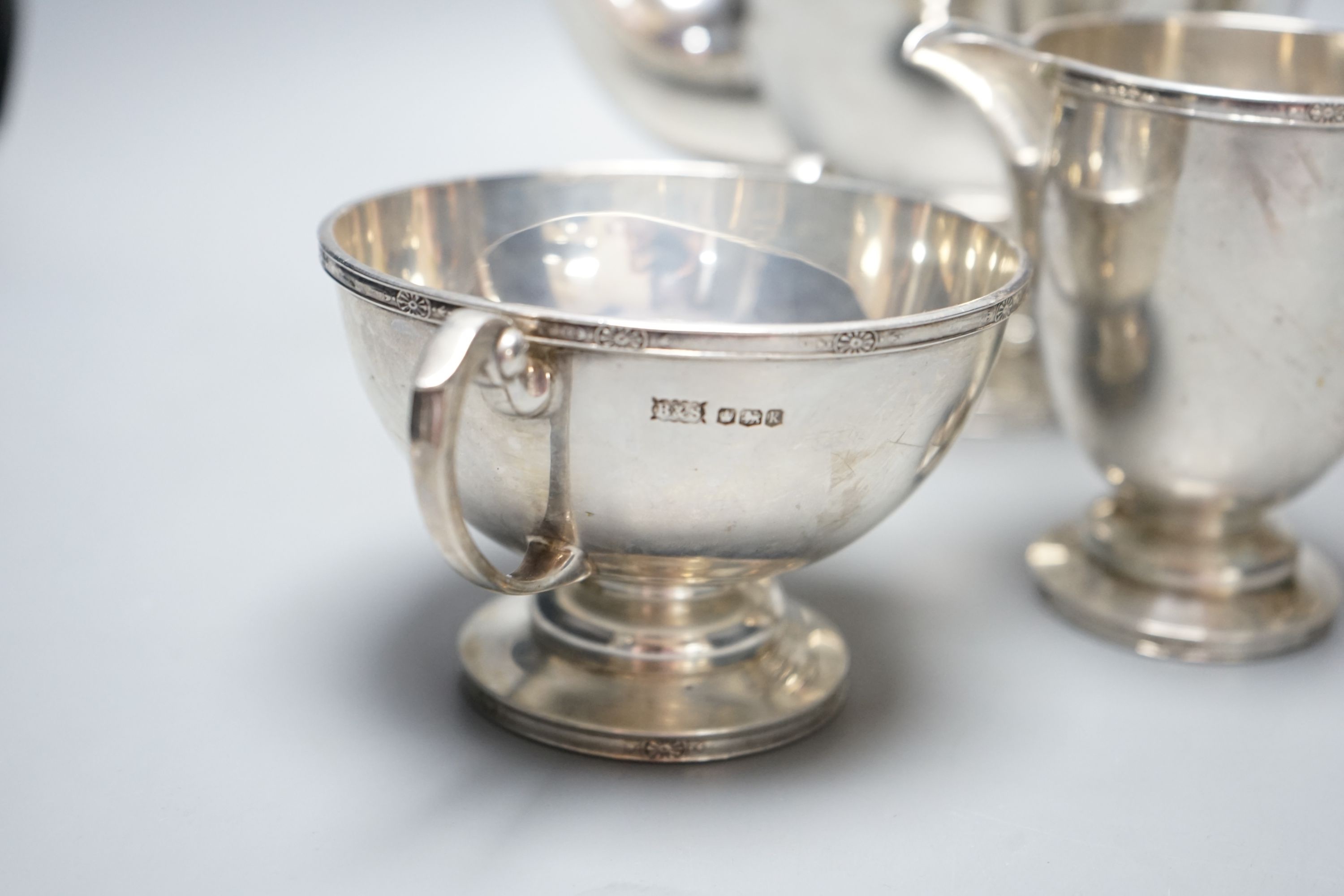 A George V silver four piece pedestal tea set, Brook & Son, Sheffield, 1926/7